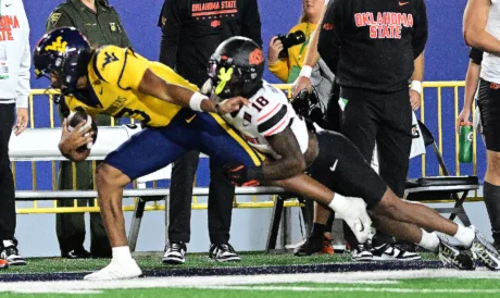 Mestemaker, Oklahoma State pound WVU, 41-24